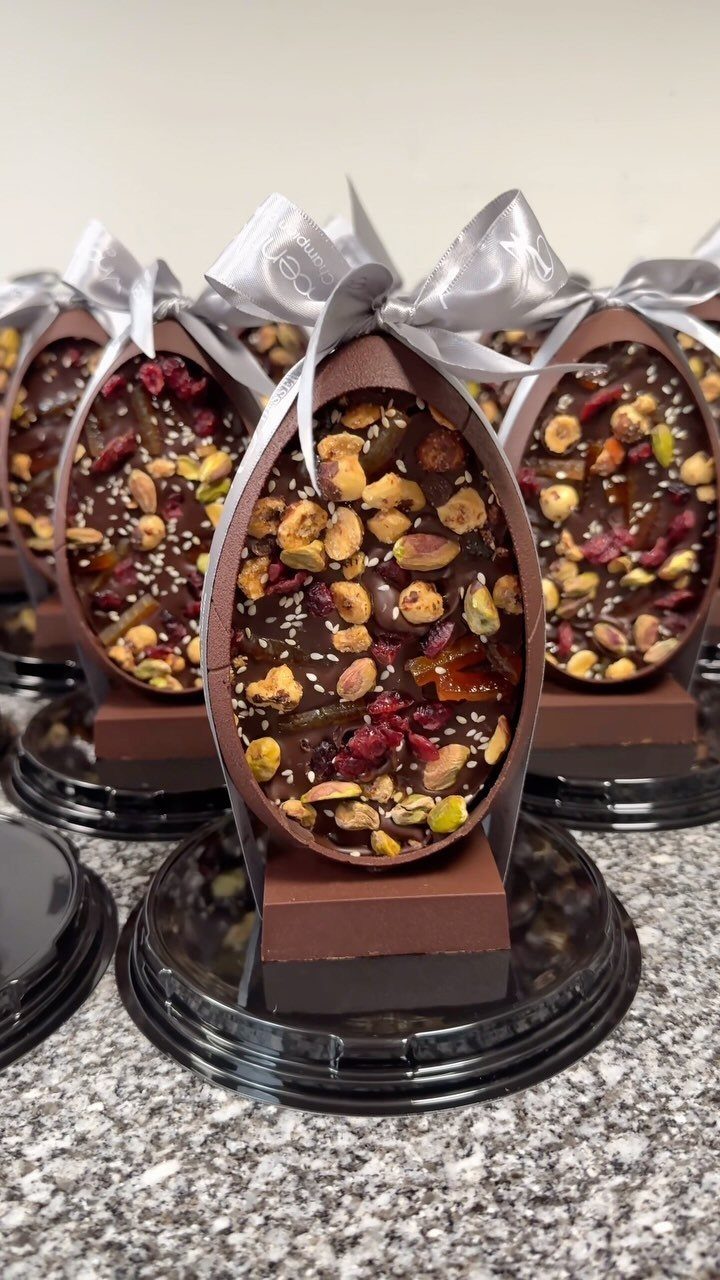 Chocolate eggs filled with nuts and dried fruit tied with silver ribbons