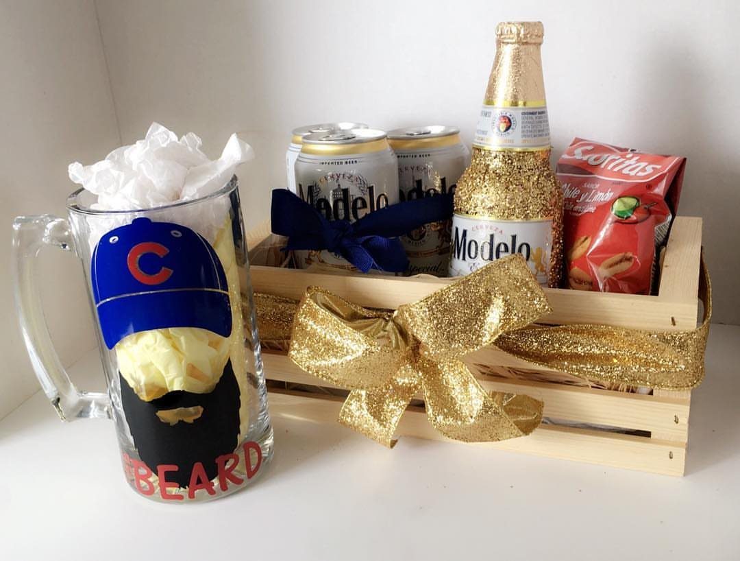 Beer gift basket in a wooden crate with Modelo beer and gold bow.