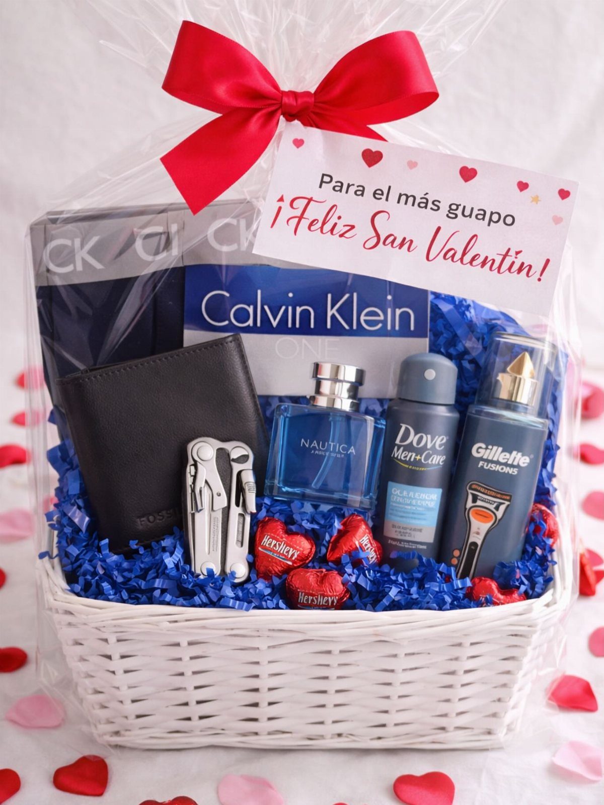 White wicker gift basket with grooming products, wallet, and chocolates for Valentine's Day.