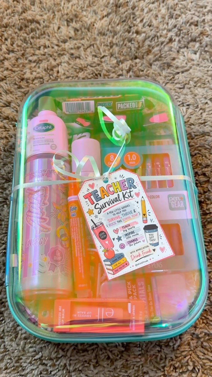 Teacher survival kit in a clear plastic bin with a pink water bottle.