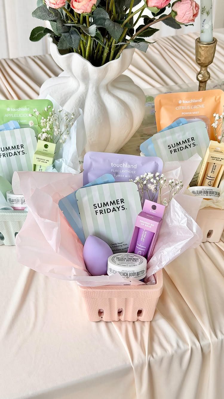 Pink berry basket filled with skincare products and tissue paper on a beige tablecloth