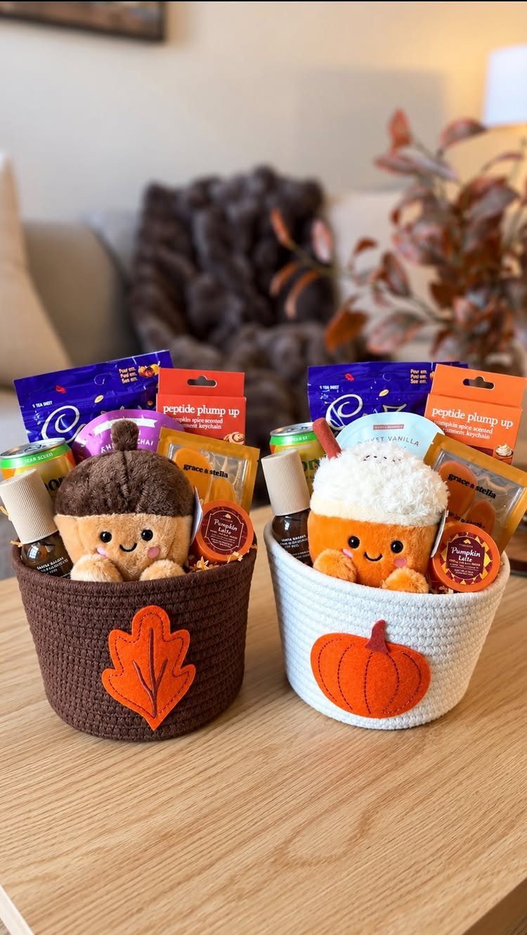 Two crocheted fall gift baskets filled with skincare products and cute autumn plushies.