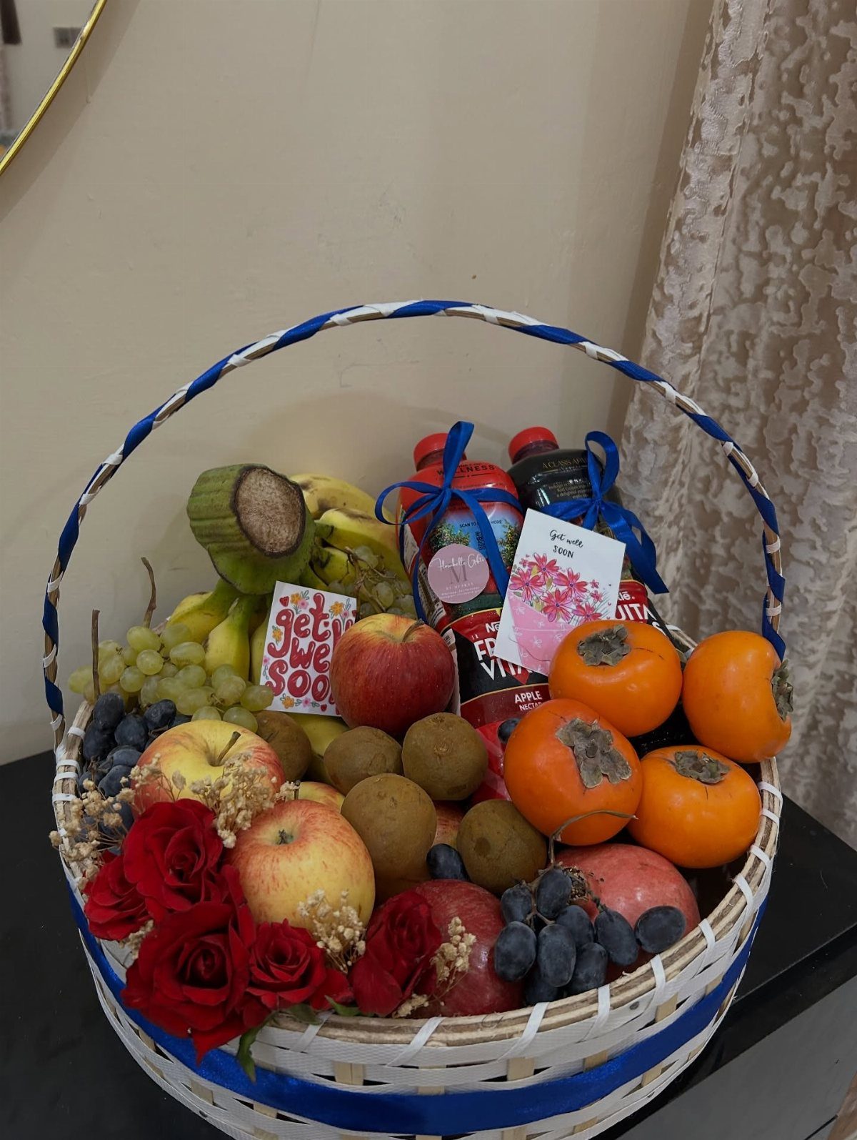 Fruit and flower gift basket with a get well soon card