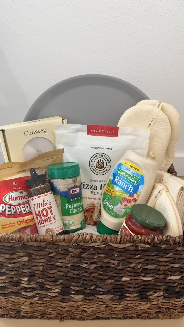 Pizza ingredients in a woven basket including pepperoni, flour, and ranch dressing.
