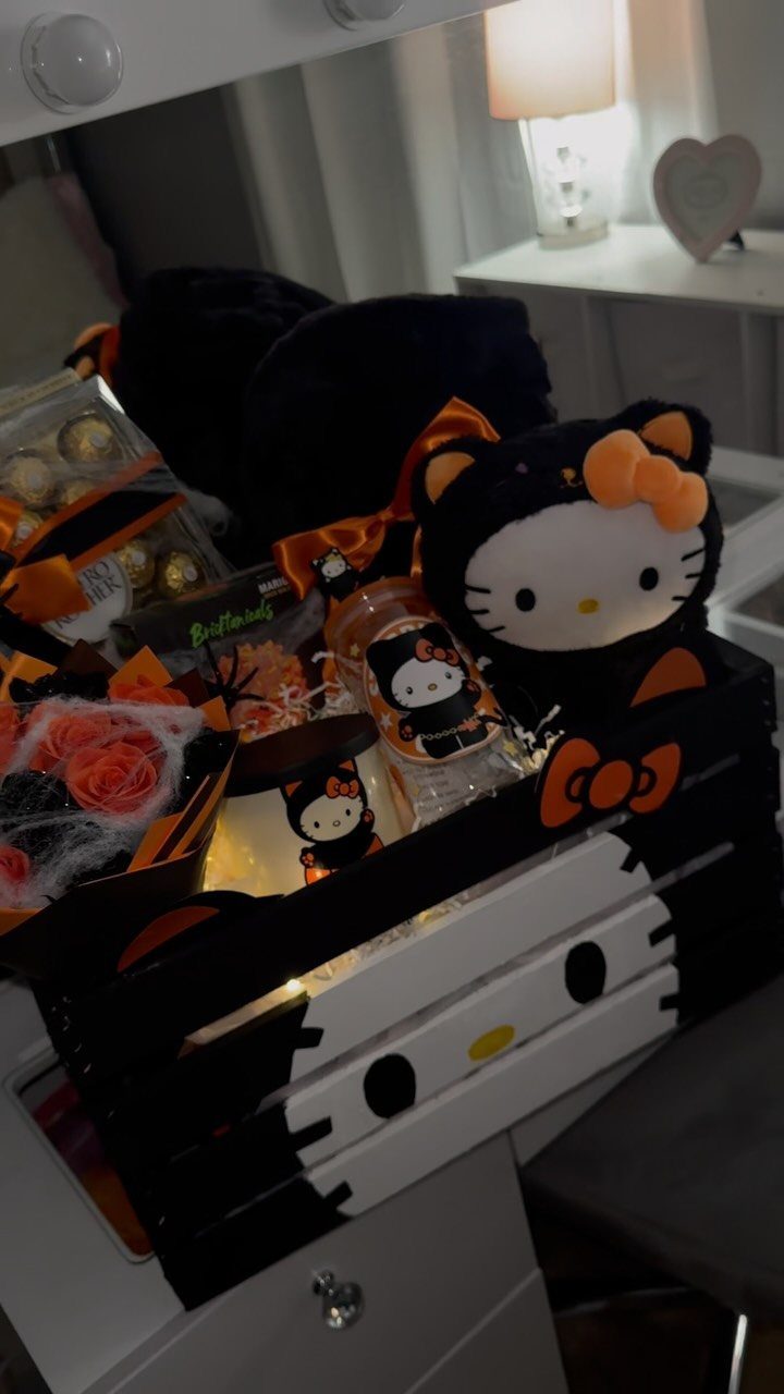Hello Kitty themed Halloween boo basket with plush toy and orange ribbons