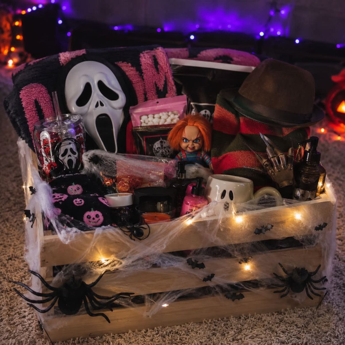 Wooden Halloween boo basket filled with horror movie character merchandise and spooky decorations.